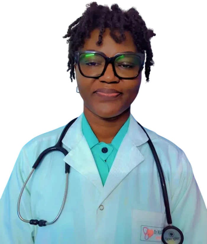 Dr Micheline Mambue Epse Bilongo Plong, wearing a white coat and a stethoscope.
